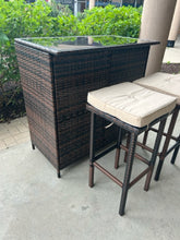 Load image into Gallery viewer, NEW Woven Outdoor Bar with Glass Top and Shelf & Two Stools with Light Tan Cushions