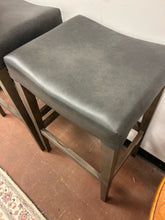 Load image into Gallery viewer, Pair of "Vail Saddle" Barstools in Greyland Maple with "Pewter" Leather Seats from Bassett Furniture