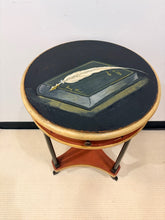 Load image into Gallery viewer, Round one Drawer Occasional Table with Painted Book Accent