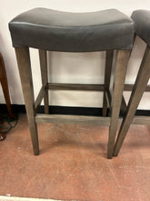 Load image into Gallery viewer, Pair of "Vail Saddle" Barstools in Greyland Maple with "Pewter" Leather Seats from Bassett Furniture