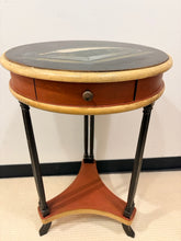 Load image into Gallery viewer, Round one Drawer Occasional Table with Painted Book Accent