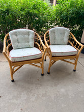 Load image into Gallery viewer, Pair of Vintage Bent Bamboo/Rattan Arm Chairs with Cushions Featuring Birds &amp; Reed Upholstery
