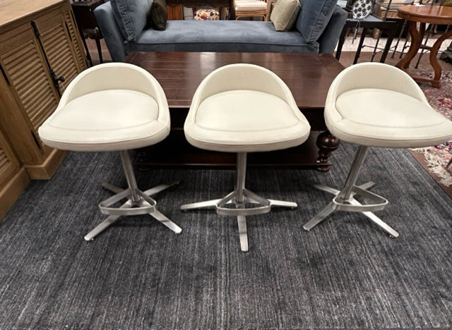 Three Swivel Counter Stools with Metal Base &  Foot Rest in Cream Faux Leather Vinyl from Cumberland