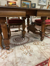 Load image into Gallery viewer, Vintage Oak Dining Table (1880&#39;s), with Four Ladderback Upholstered Chairs &amp; 3 Leaves
