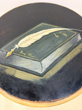 Load image into Gallery viewer, Round one Drawer Occasional Table with Painted Book Accent
