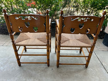 Load image into Gallery viewer, Pair of Vintage Turned Wood &amp; Rattan Arm Chairs with Cutout Backs
