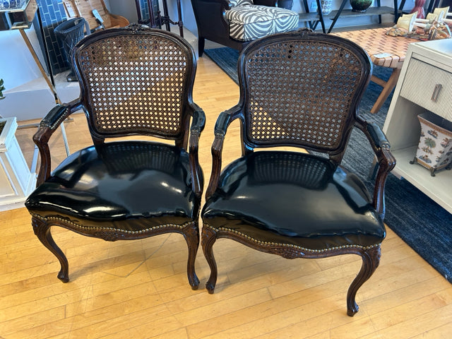 Pair of Cane Back Louis XV Carved Chairs with  Black Patent Leather Seats