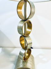 Load image into Gallery viewer, Stacked Ring Lamp in Brushed Silver with Metal Base (Rings turn)
