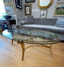 Load image into Gallery viewer, Oval Glass Top Coffee Table with Gold Leaf Metal Base
