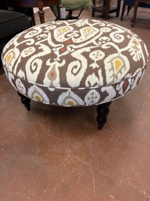 Round Upholstered Ottoman on Wood Legs