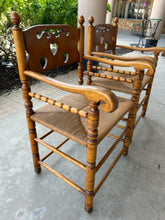 Load image into Gallery viewer, Pair of Vintage Turned Wood &amp; Rattan Arm Chairs with Cutout Backs
