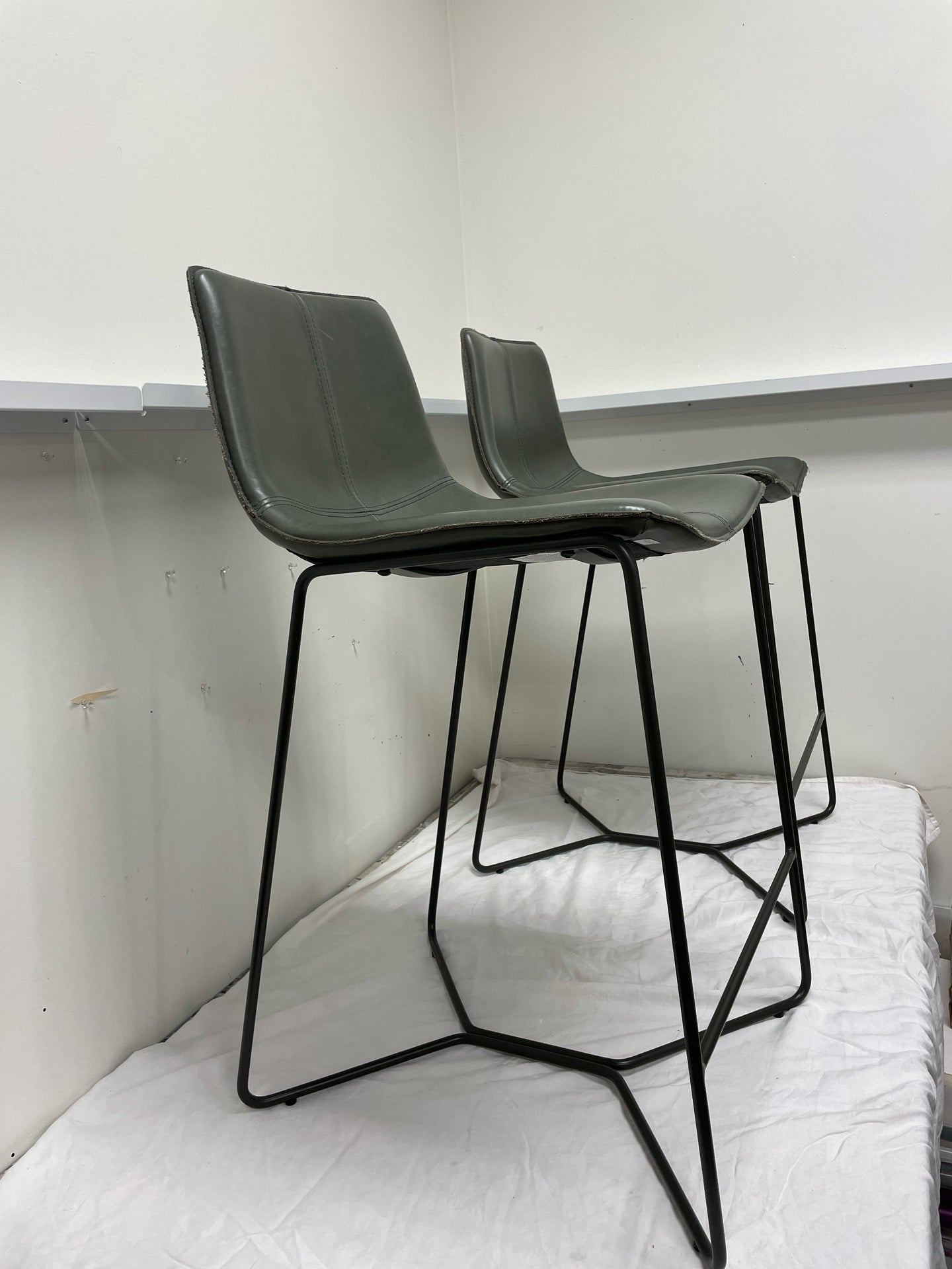 Pair of Slope Gray Leather Barstools from West Elm