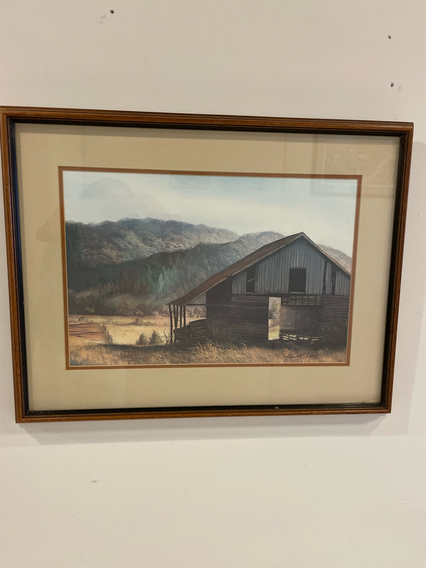 Framed Print of Barn and Mountains by Russell May, signed
