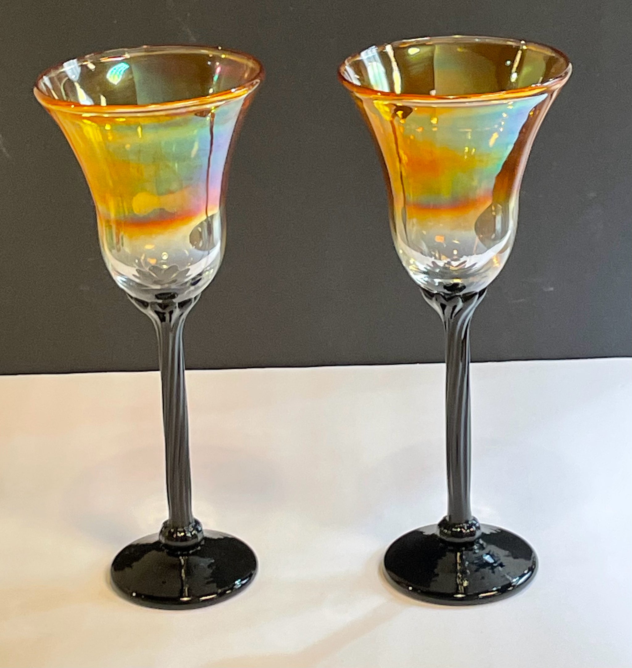 Pair of Large Iridescent Wine Glasses with Black Stems, signed