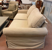 Load image into Gallery viewer, Tan Slip Covered Sofa from Pottery Barn
