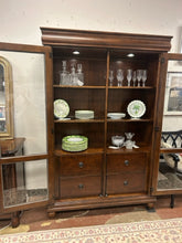 Load image into Gallery viewer, Lighted Glass Front Cabinet with  Interior Shelves &amp; Drawers from Liberty Furniture
