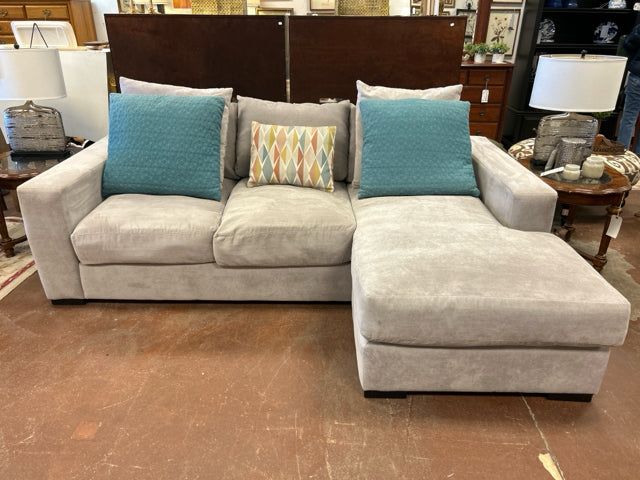 Grey Micro Suede Reversible Sectional with Throw Pillows from Roy's Furniture