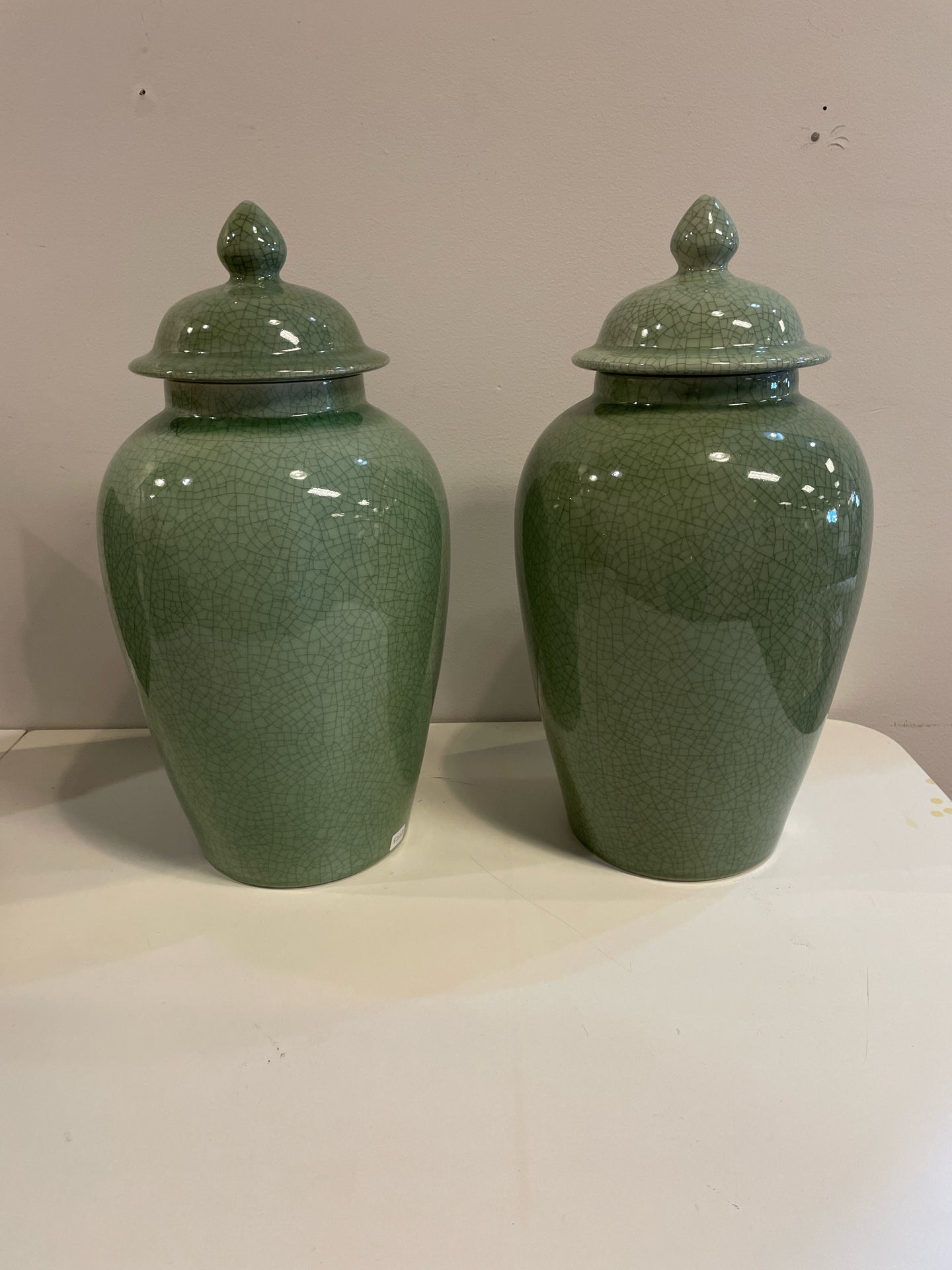 Pair of Green Ceramic Lidded Jars