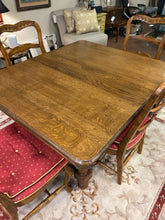Load image into Gallery viewer, Vintage Oak Dining Table (1880&#39;s), with Four Ladderback Upholstered Chairs &amp; 3 Leaves
