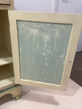 Load image into Gallery viewer, Vintage Shabby Chic Side Table/Cabinet on Casters with Green Detailing
