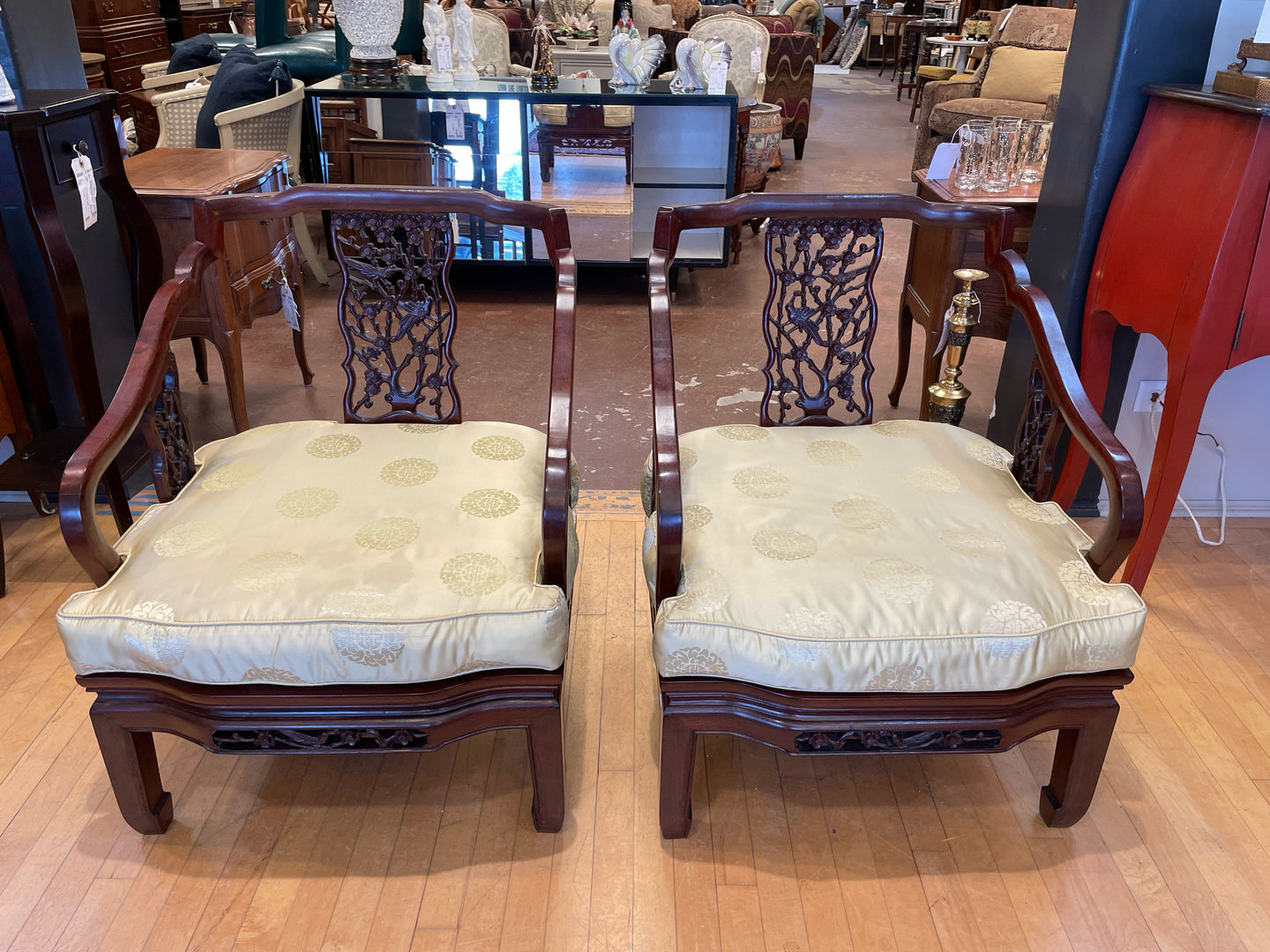 Pair of Asian Inspired Carved Wood Chairs with Upholstered Cushions