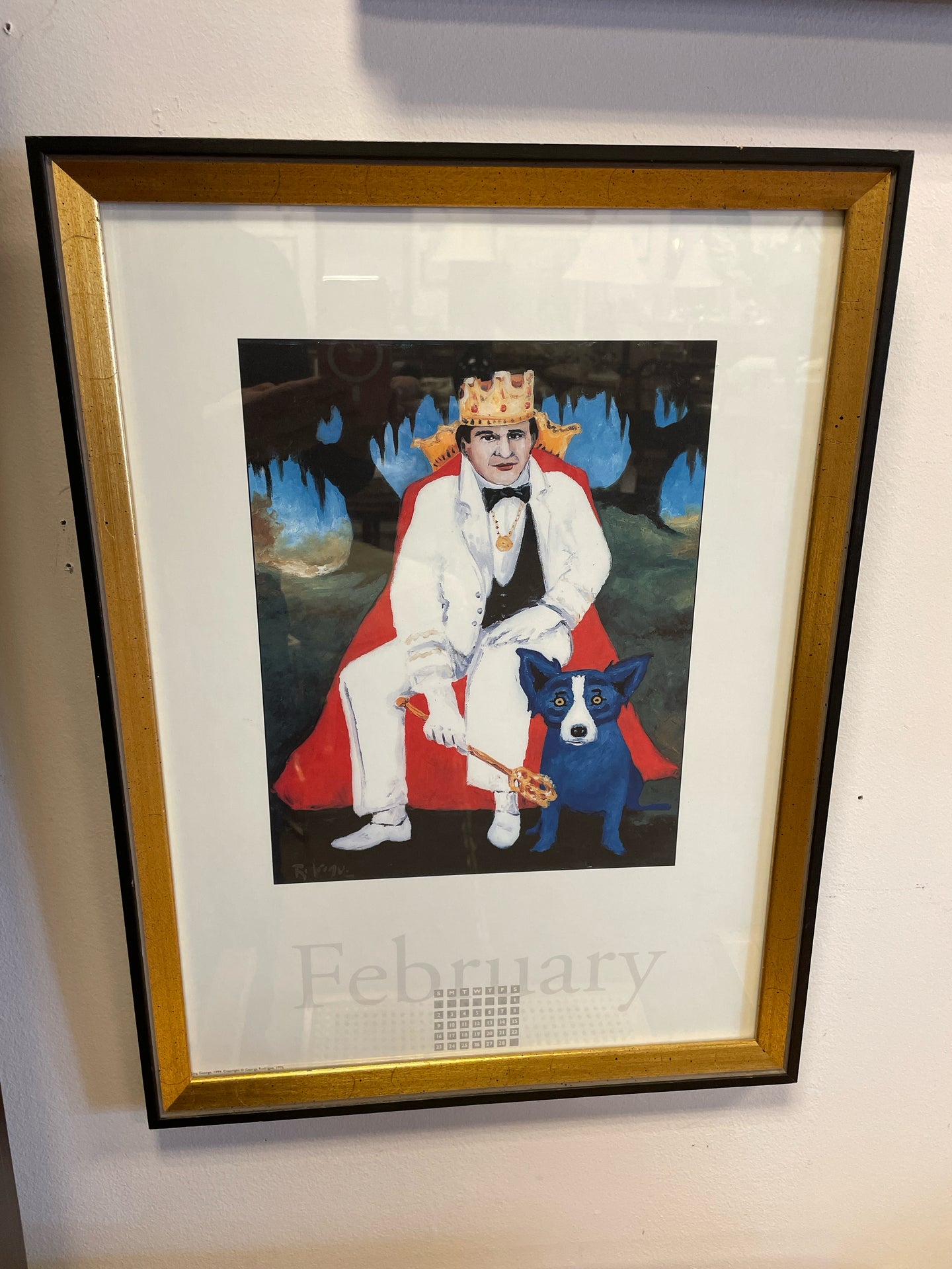 Gold Framed Print of Artist & Blue Dog by George Rodrigue